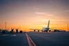 Traffic,At,Airport,At,Golden,Sunset.,Wide,Shot,Of,Passenger