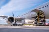 Air,Cargo,Logistic,Containers,Are,Loading,To,An,Airplane.,Air