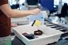 Airport,Security,Check,Before,Flight.,Passenger,Holding,Plastic,Bag,With