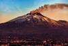 Catania,Cityscape,And,The,Mount,Etna,Volcano,With,Smoke,At