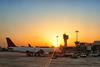 Scenic,Sunrise,Over,Airport,Airside,Apron,With,Airport,Terminal,Building