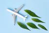 Sustainable,Aviation,Fuel.,White,Airplane,Model,Fresh,Green,Leaves,On