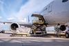 Air,Cargo,Logistic,Containers,Are,Loading,To,An,Airplane.,Air