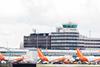 Three,Easyjet,Airbus,A320-214,Aircraft,Pictured,In,A,Terminal,Under