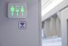 Green,Sign,Of,Lavatory,In,The,Airplane,During,Fly.,A
