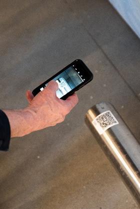 QR code integrated into secondary building materials for location tracking