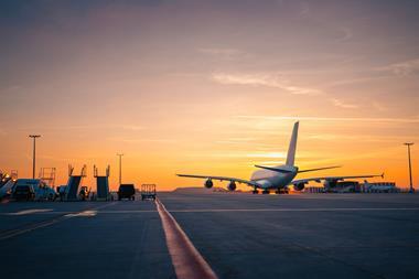 Traffic,At,Airport,At,Golden,Sunset.,Wide,Shot,Of,Passenger