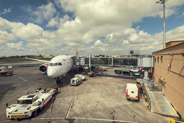 Nairobi,,Kenya,,28-10-2025:,Commercial,Airplane,With,Luggage,And,Service,Vehicles