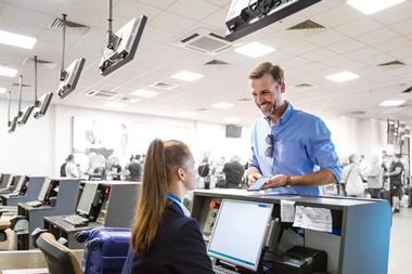 Passenger doing check-in for flight at airport