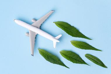 Sustainable,Aviation,Fuel.,White,Airplane,Model,Fresh,Green,Leaves,On