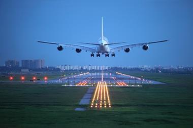 passenger plane fly up over take-off runway from airport
