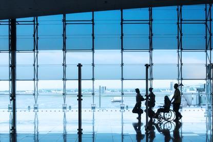 Passengers,And,Disabled,Person,In,The,Interior,Of,The,Airport