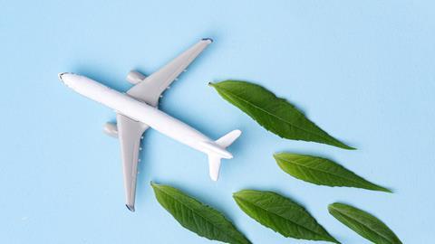 Sustainable,Aviation,Fuel.,White,Airplane,Model,Fresh,Green,Leaves,On
