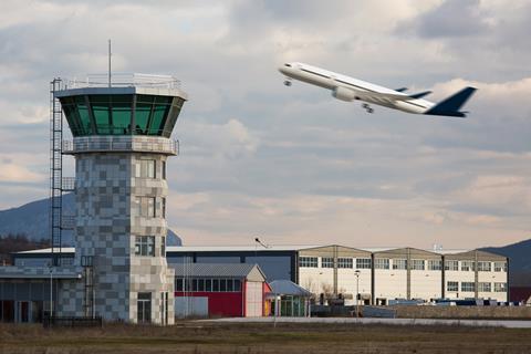 The,Plane,Takes,Off,At,The,Airport