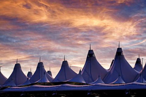 Glowing,Tents,Of,Dia,At,Sunrise.,Denver,International,Airport,Well