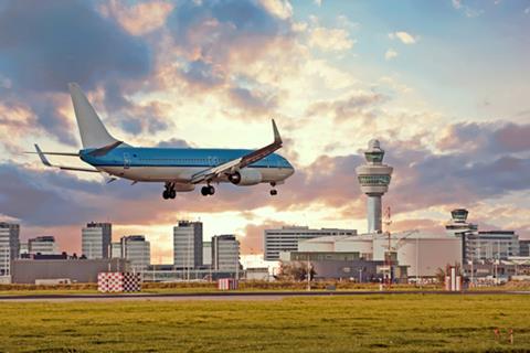 Airplane,Landing,On,Schiphol,Airport,In,Amsterdam,In,The,Netherlands