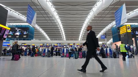 London,,Uk,-,April,15,,2018:,Air,Travelers,Check,Into