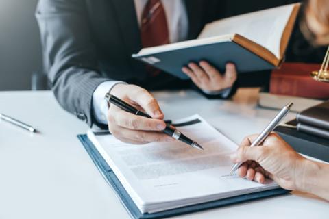 Businessman,And,Lawyer,Discuss,The,Contract,Document.,Treaty,Of,The