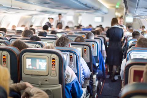 Interior,Of,Large,Passengers,Airplane,With,People,On,Seats,And