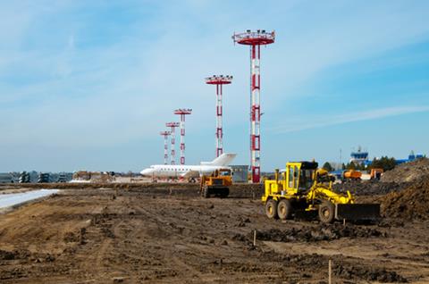 Grader,And,Aircraft,At,Reconstruction,Airfield.