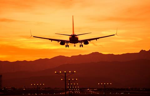 Landing,Airplane,At,Sunset.,Las,Vegas,International,Airport,,Nevada,,United
