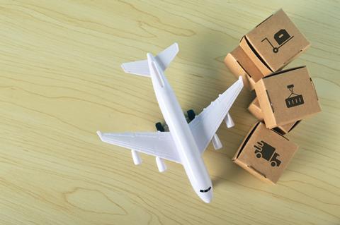 Stack,Of,Cardboard,Boxes,And,Airplane,With,Fast,Delivery,Of