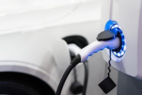 Charging,An,Electric,Car,Battery,Access,To,Vehicle,Electrification