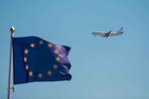 Flying,Airplane,In,The,Sky,Against,The,Background,Of,The