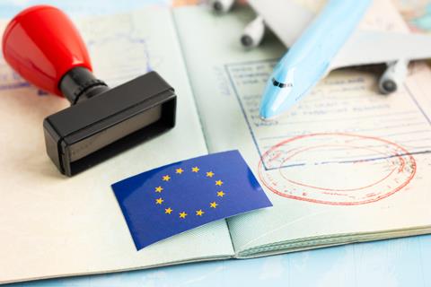 Eu,Flag,With,Approved,Stamp,Visa,And,Passport,Document,To