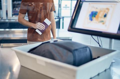 Airport,Security,Check.,Young,Man,Waiting,For,X-ray,Control,His